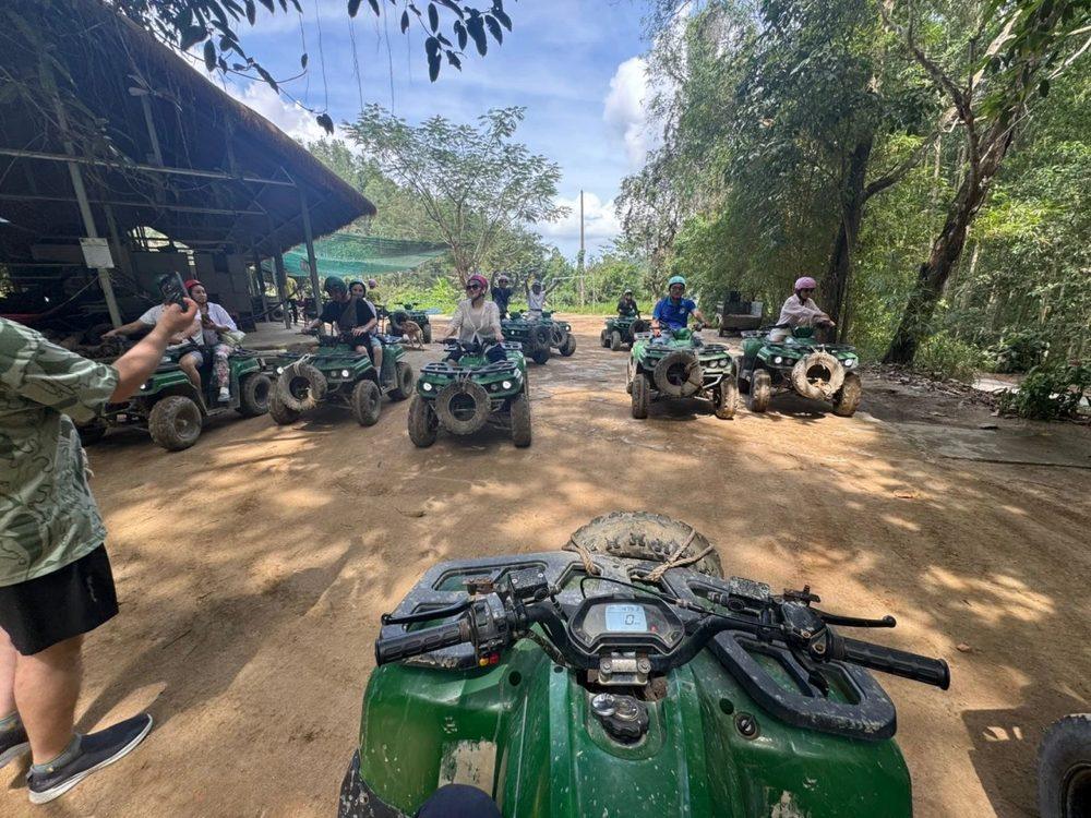 A line of quad bikes at the start by the base